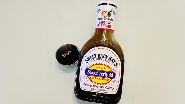 Bottle of Sweet Baby Ray's Sweet Teriyaki Sauce & Marinade with ramekin on side