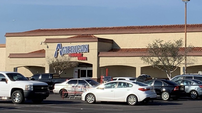 The front entrance of an American Discount Foods grocery store.
