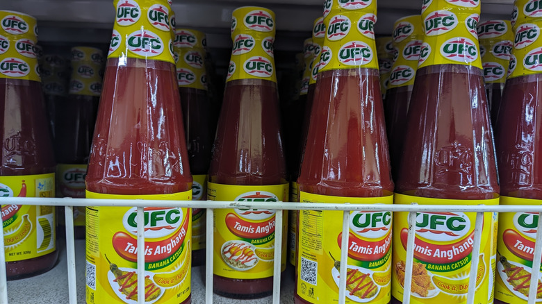 Shelf of UFC banana ketchup bottles