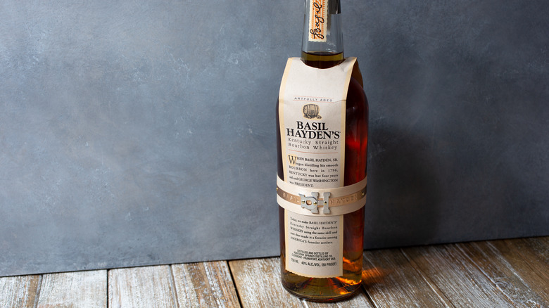 Bottle of Basil Hayden's on wooden floor