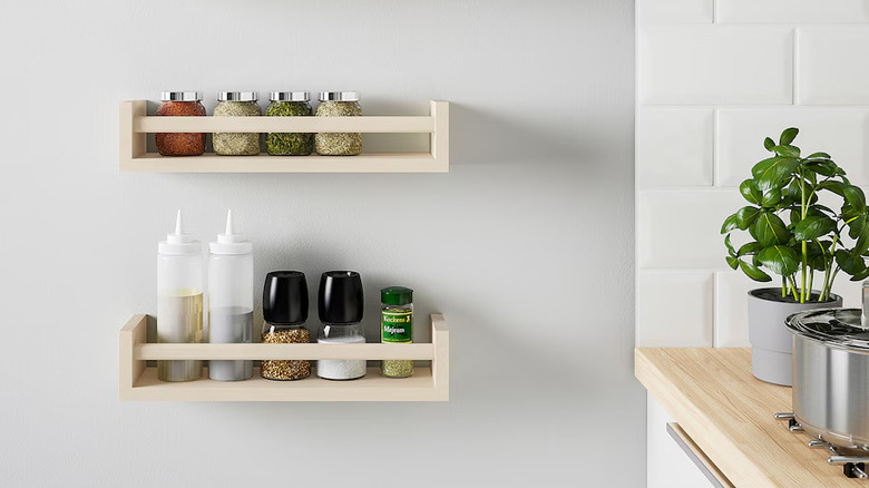 Spice racks mounted on wall in kitchen