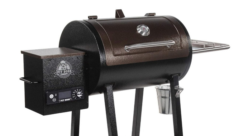 A bronze and black Pit Boss PB440D2 grill