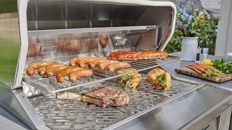 An outdoor kitchen with a Coyote Built-in