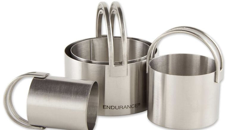 Three stainless steel cutters with dual handles