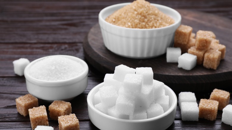 Brown and white sugar in bowls