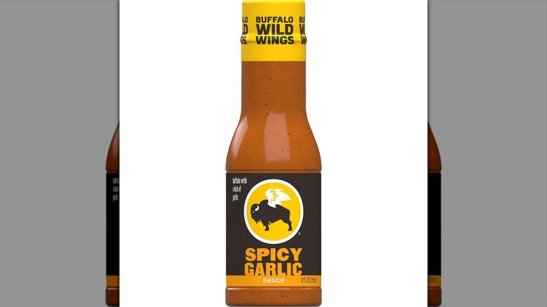 A bottle of Buffalo Wild Wings Spicy Garlic Sauce