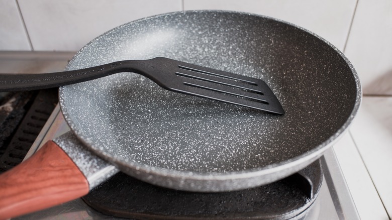 non-stick pan displayed with spatula
