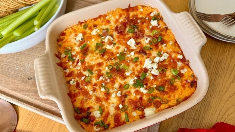 Buffalo chicken dip with garnishes