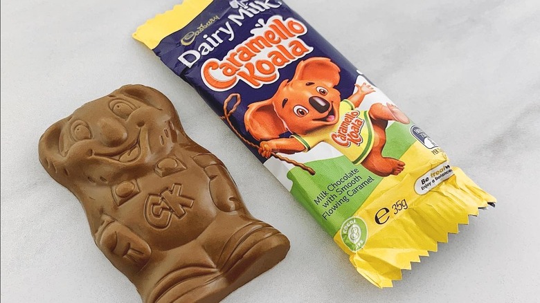 A Cadbury Caramello Koala chocolate next to it's wrapper