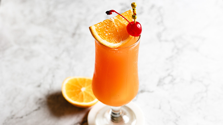 hurricane cocktail on marble coaster