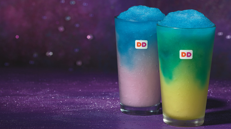 Two Cosmic drinks against a sparkly purple background