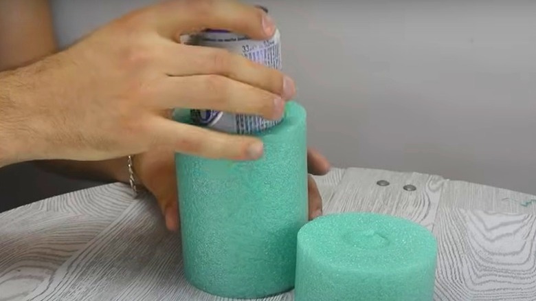 Beer can inside DIY pool noodle koozie