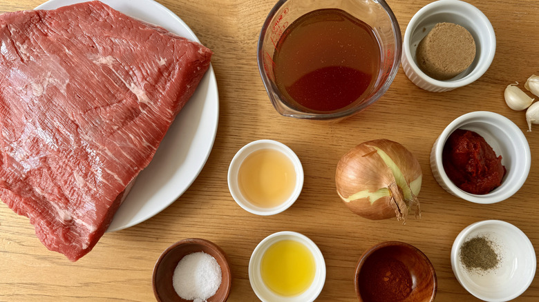 Ingredients for Passover braised brisket on wood table