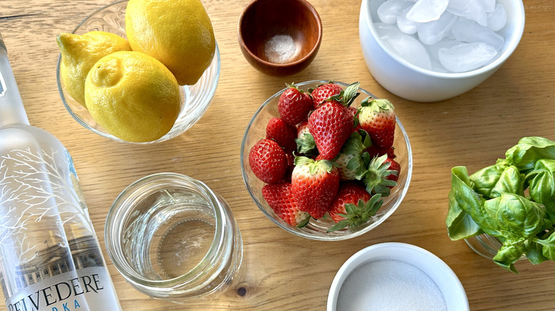 lemons, sugar, strawberries, and basil