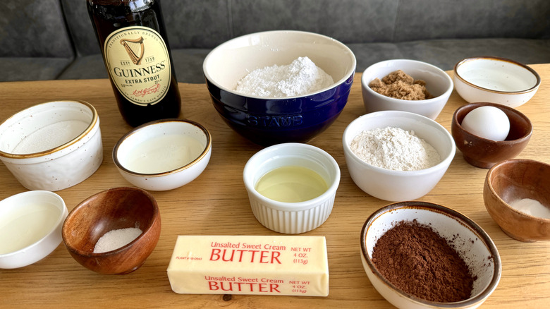 Chocolate stout cupcake ingredients on wooden counter