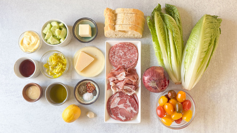 Italian deli grinder salad ingredients on countertop
