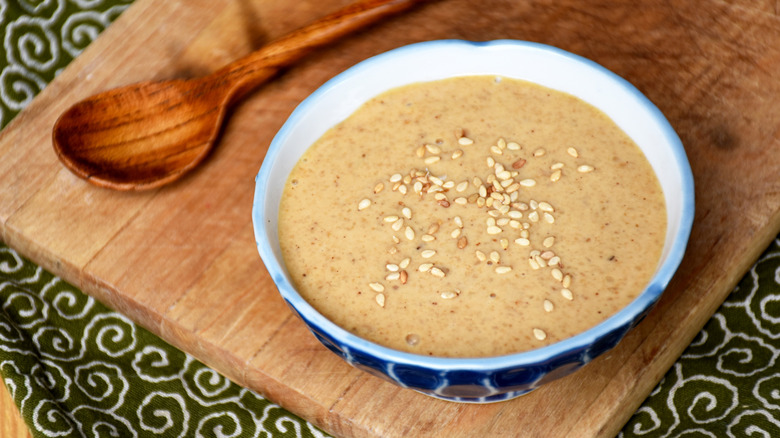 goma sauce on wooden board