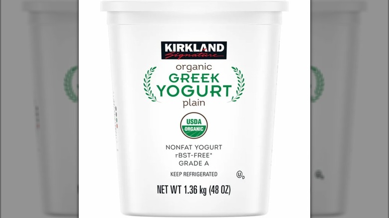 A container of Kirkland Signature organic Greek yogurt