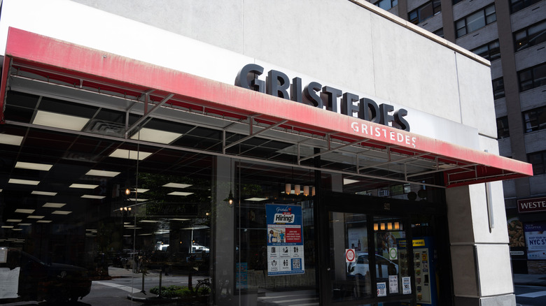 The front entrance of a Gristedes grocery store.