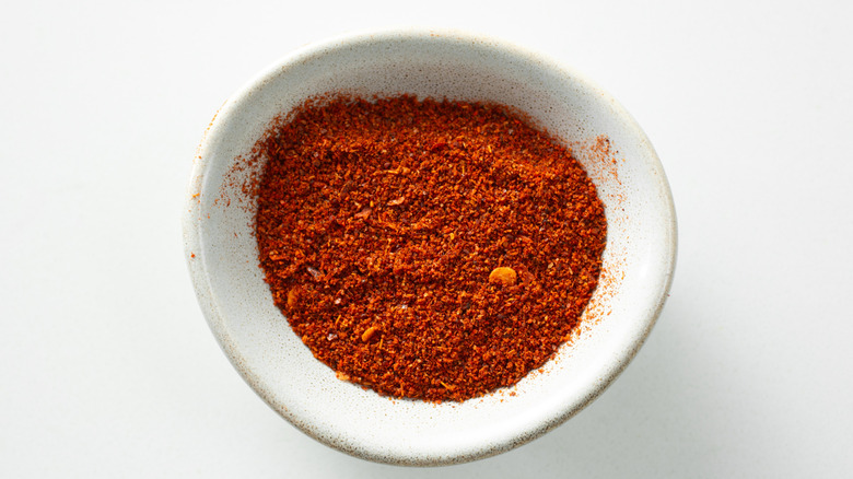 Harissa spice in a white bowl