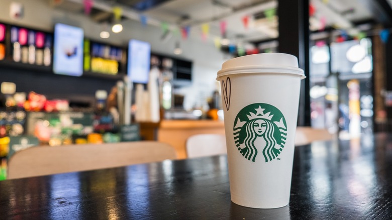 Starbucks cup on table