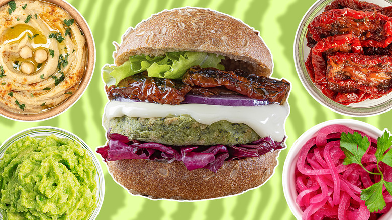 Plant burger with toppings around it