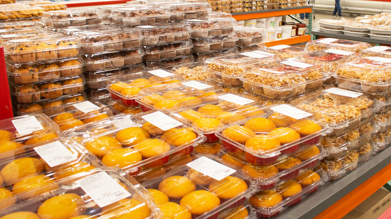 Bulk pastries on display tables at Costco