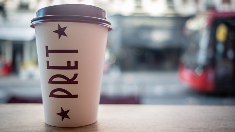 Pret coffee cup on wooden table