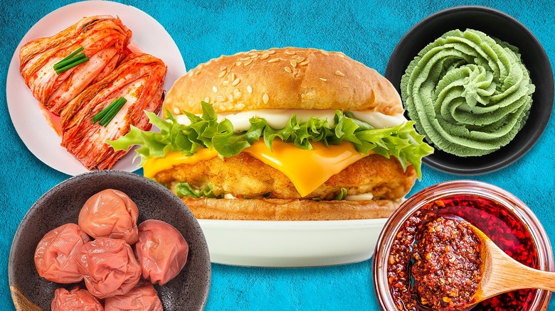Fried fish sandwich surrounded by specialty toppings