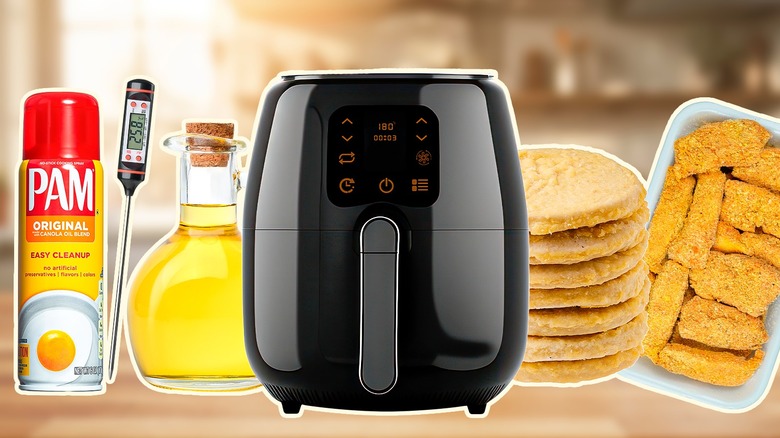 Air fryer with with fried dishes, cooking oil and spray, and a thermometer