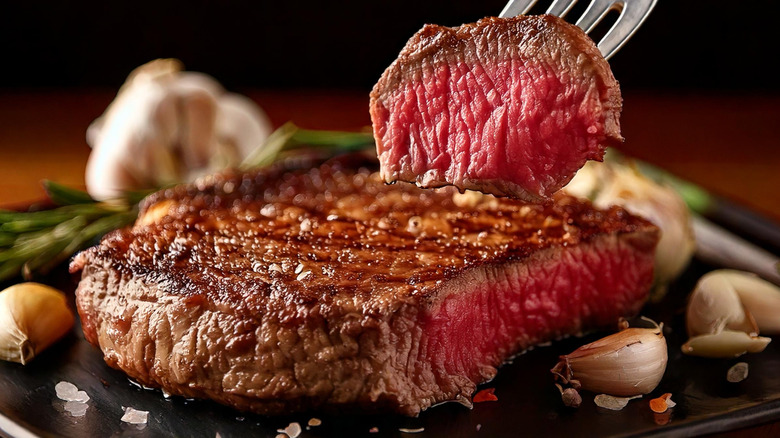 Perfect bite of steak on a fork