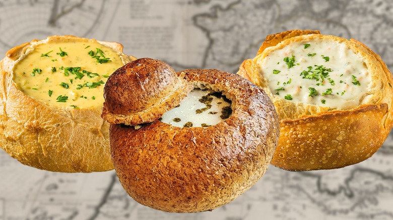 Three bread bowls filled with soups
