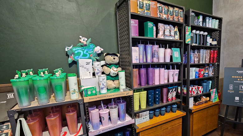 Starbucks reusable cups displayed in store