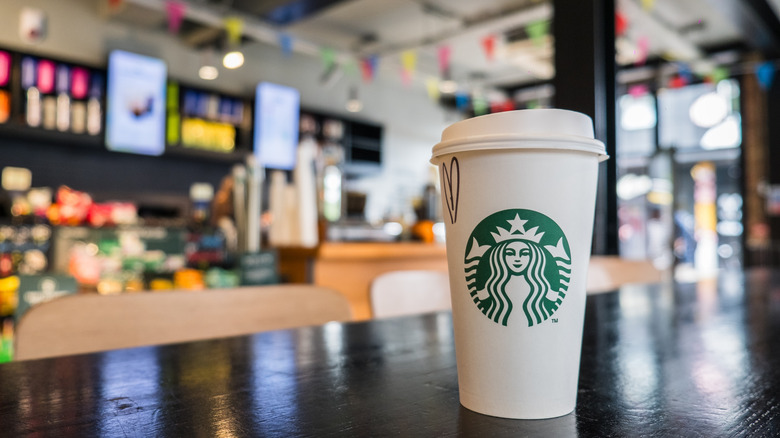 Starbucks cup on table