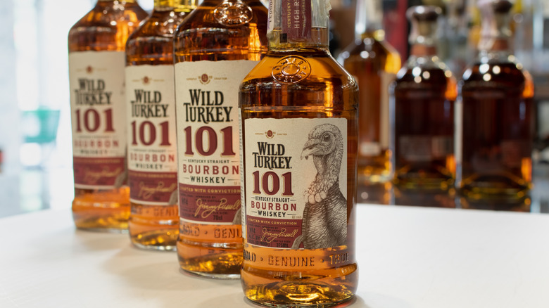 Four bottles of Wild Turkey 101 side by side