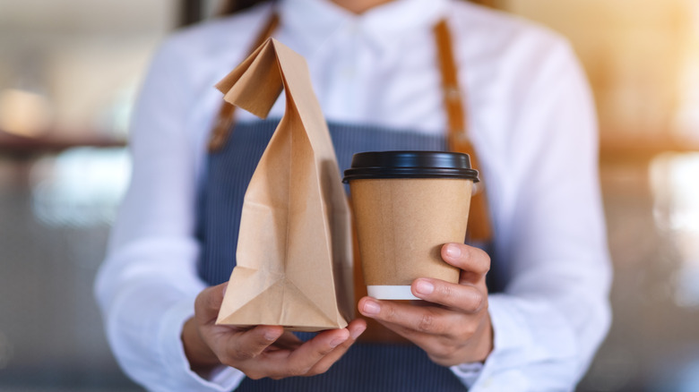 woman serving generic fast food