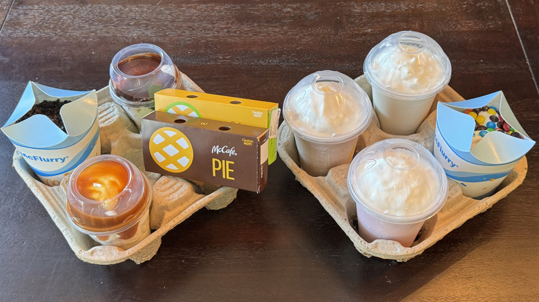 An assortment of McDonald's desserts sitting on a table