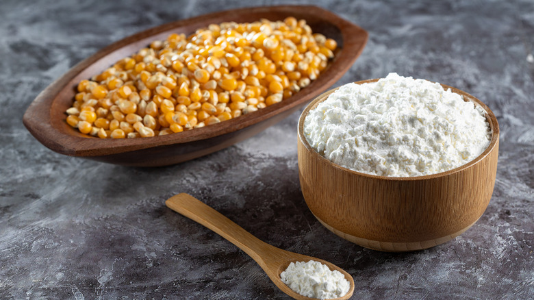 Corn starch and corn kernels in two separate dishes