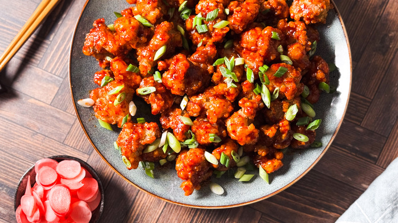 Sweet and spicy Korean fried popcorn chicken on serving platter
