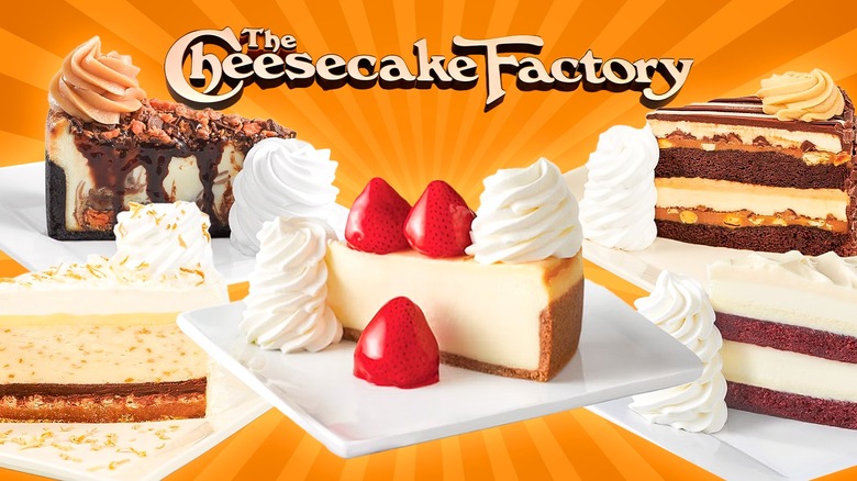 Cheesecakes are on display below a logo for The Cheesecake Factory.