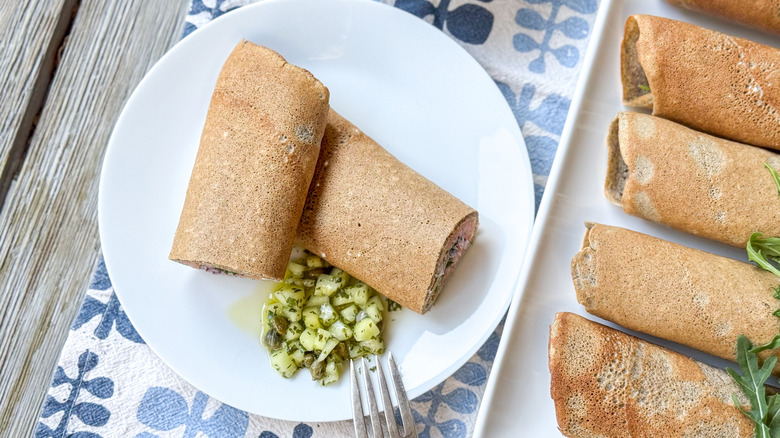 Buckwheat crepes With salmon and homemade creme fraiche and cucumber dressing