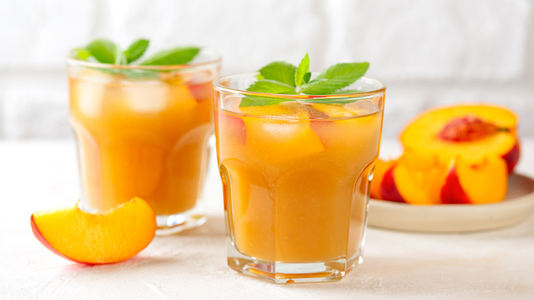 2 cold peach cocktails