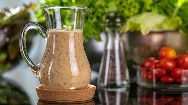 Rich, creamy vinaigrette dressing in a pitcher