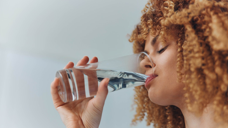 Woman drinking a glass of water