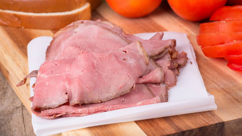 Roast beef slices on paper