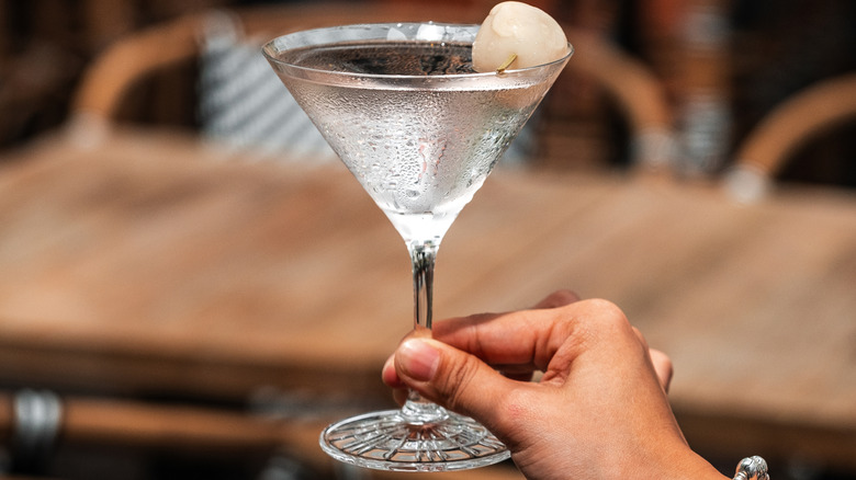 person holding lychee martini