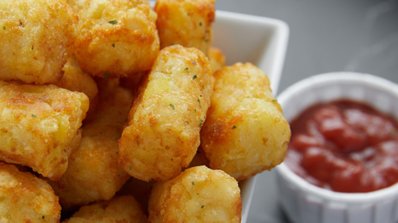 Crispy tater tots with ketchup