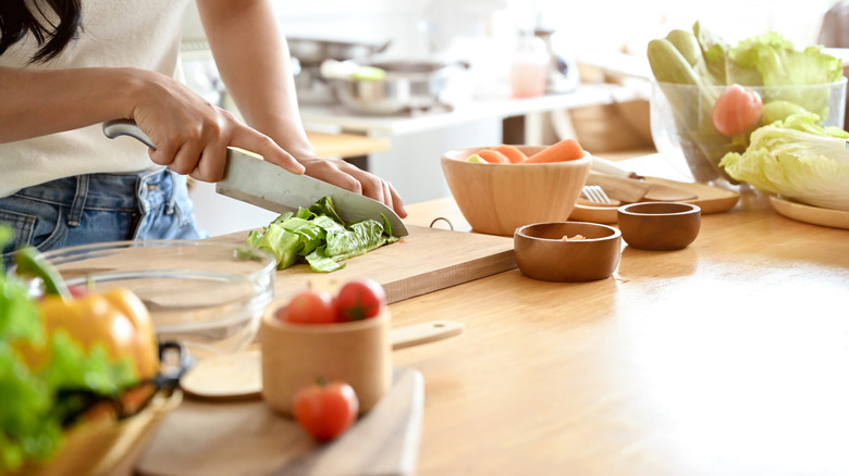 Person prepping food in kitchen