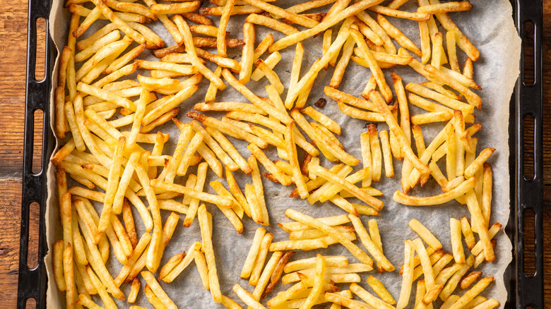 Sheet pan of cooked frozen french fries