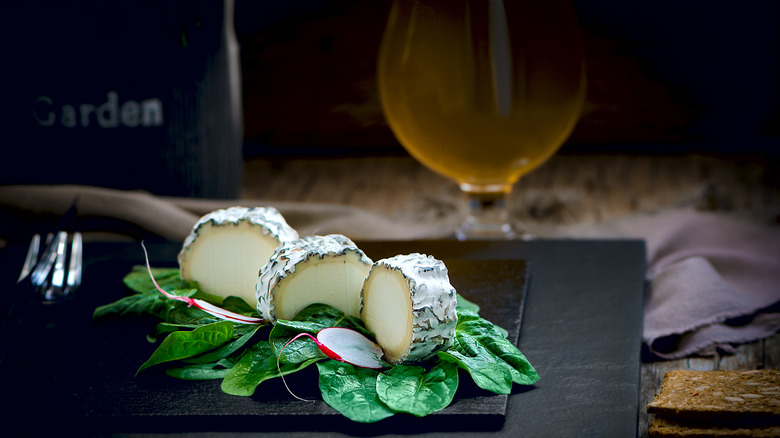 goat cheese with beer in the background